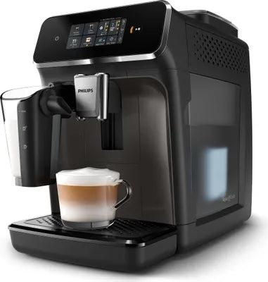 Black Philips coffee machine with a glass of cappuccino on a white background