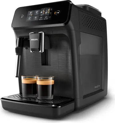 Black Philips espresso machine with two cups of coffee on a white background