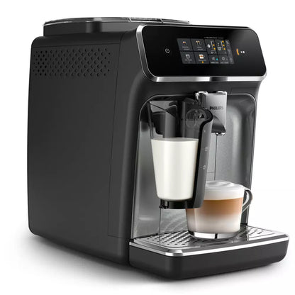 Black coffee machine dispensing a cappuccino into a glass on a white background